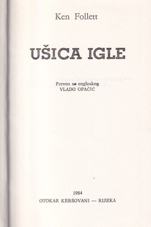 Bijela naslovnica s crnim pravokutnikom u kojoj je zlatna kontura pauna na naslovnici Follettovog romana Ušica igle.