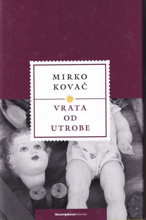 Crno bijela fotografija lutkom čija je glava odvojena od tijela na naslovnici romana Vrata od utrobe Mirka Kovača.